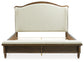 Sturlayne California King Upholstered Panel Bed with Mirrored Dresser