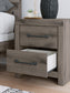 Graystorm King Panel Bed with Mirrored Dresser and Nightstand