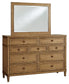 Sharlance California King Upholstered Panel Bed with Mirrored Dresser and Nightstand